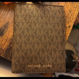 Michael Kors Passport/Wallet holder.